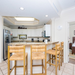 Sip your morning coffee at the breakfast bar and get ready for a day of adventure in this stylish space