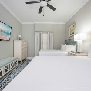 Unwind in this queen guest suite and stream your favorite shows or enjoy a good movie after a beach day