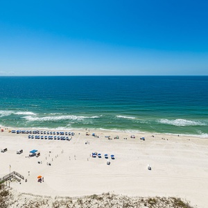 Gaze out at the coast from your spacious balcony, where the soothing sounds invite relaxation and blissful moments