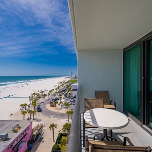 Look out over the sparkling coast from your balcony as gentle waves meet the shore below
