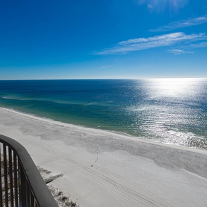 Experience seemingly endless coastline views of the horizon as waves lap the shore and the sun glistens over the water