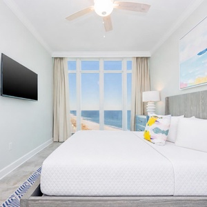 Open the curtains and let gulf light warm your face as you admire the shore from this king guest suite
