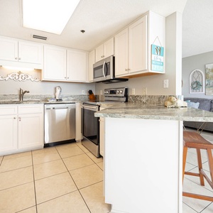 Prepare meals at the spacious kitchen with granite countertops and stainless appliances