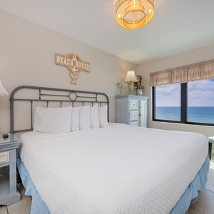 Unwind in the king master suite, where soft bedding invites restful nights and the coast view inspires tranquil mornings