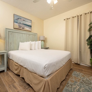 Relax in this inviting guest bedroom featuring a comfortable queen bed, stylish decor, and a soothing color palette