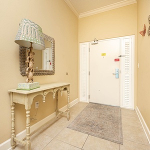 Step into your beach retreat, greeted by inviting decor and a charming entryway that sets a warm, welcoming vibe