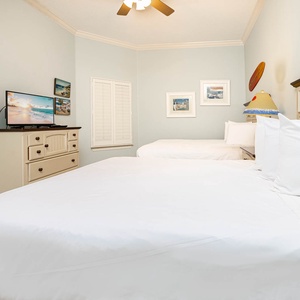 Enjoy restful nights in this queen guest suite, streaming favorite shows on the TV while surrounded by fun decor