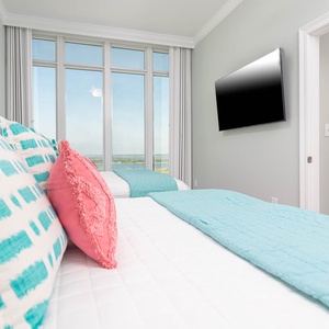Stretch out on one of the soft queen beds, play shows on the TV, and watch the gulf through the windows