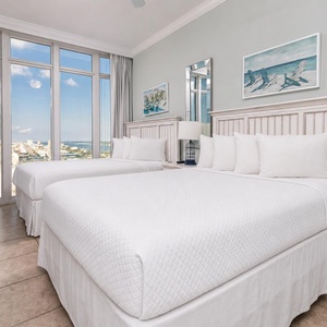 Cozy guest suite with stunning views and two queen beds with soft linens and fluffy pillows