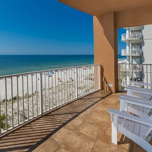 Take in the fresh gulf air on the balcony with seating and views of the sparkling gulf waters and shoreline below