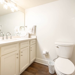 Refresh in this guest bathroom featuring a spacious vanity and fresh towels