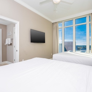 Unwind in this queen guest suite and stream your favorite shows or enjoy a good movie after a beach day