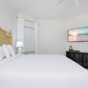 Relax on the cozy king bed in this guest suite and stream your favorite shows after a fun vacation day