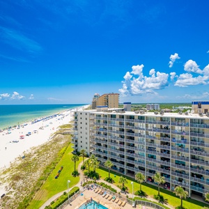 Compliment your stay with expansive beachfront views from this vibrant condo on the beach