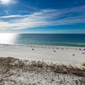 Stunning view of the sparkling water and beach, perfect for relaxation and sun-soaked days