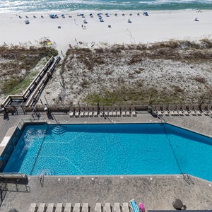 Take a refreshing dip in the large gradual entry pool, surrounded by lounge chairs and just steps from the beach access