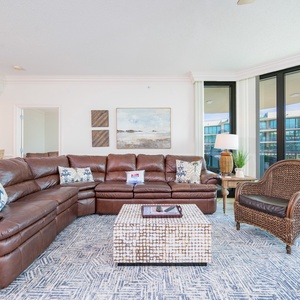 Unwind in the plush sectional with a queen sleeper, enjoying vibrant conversations and the inviting warmth