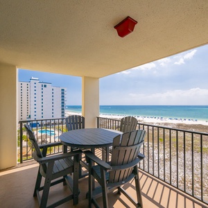Savor your morning coffee on your balcony while enjoying sweeping views of the beach and tranquil coastal vibe