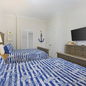 Curl up on queen beds with soft linens, feel the lamp's warm glow, and watch a movie