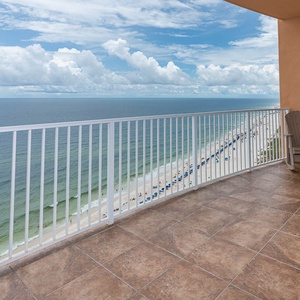 Relax on your balcony and bask in the sunlight with mesmerizing views of the gulf coast on your beach retreat
