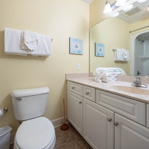 Pamper yourself in this guest bathroom, equipped with plush towels and a spacious vanity for your comfort