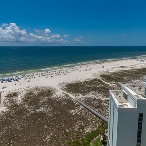 Experience seemingly endless coastline views of the horizon as waves lap the shore and the sun glistens over the water