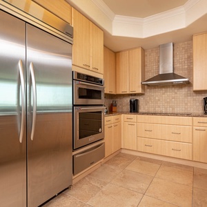 This kitchen features modern stainless appliances, granite countertops, and a spacious layout perfect for culinary adventures