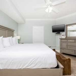 Relax on the cozy king bed in this guest suite and stream your favorite shows after a fun vacation day