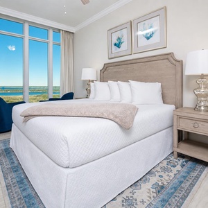Relax on the cozy king bed in this guest suite and stream your favorite shows after a beach day with stunning views