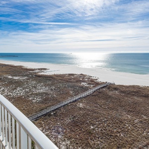 Relax on your balcony and bask in the sunlight with mesmerizing views of the gulf coast on your beach retreat
