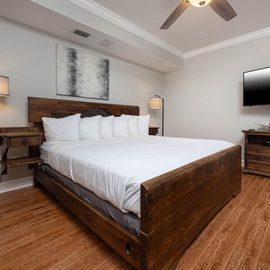 Relax on the cozy king bed in this guest suite and stream your favorite shows after a fun vacation day