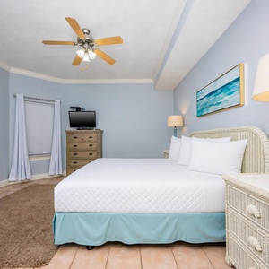 Relax on the cozy king bed in this guest suite and stream your favorite shows after a fun vacation day