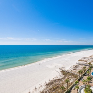 Relax on your balcony and bask in the sunlight with mesmerizing views of the gulf coast on your beach retreat