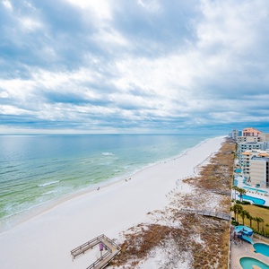 Watch the coastline stretch into the distance and the horizon meet the sky from your balcony while you soak up the sun