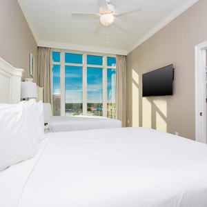 Awaken refreshed in this queen guest suite, and enjoy bright views through large windows, inviting you to start your day