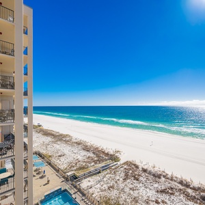 Enjoy stunning views of the turquoise waters and coastline from your balcony, perfect for relaxation and soaking in the sun