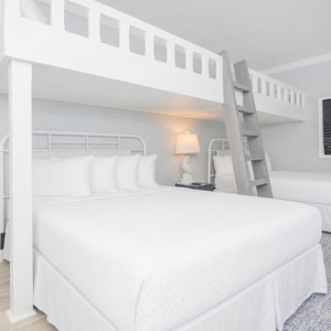 Experience a fun sleeping arrangement with a loft with two twins, cozy lower queen beds, and stylish design