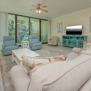 Unwind on the living room sofa with a queen sleeper, perfect for streaming your favorite shows or enjoying good company