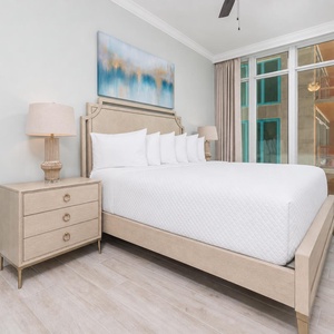 Unwind in this king guest suite with coastal views, stylish decor, and a relaxing vibe