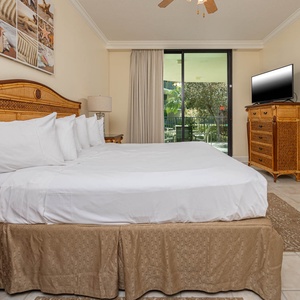 Unwind after a fun vacation day and stream your favorite shows in the king master suite with balcony access