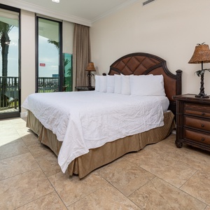 Retreat to the queen master suite with cozy bedding and drift off to coastal sights and sounds of the bay