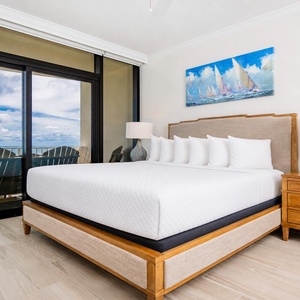 Retreat to this elegant king master suite on the beach with stunning views and plush bedding