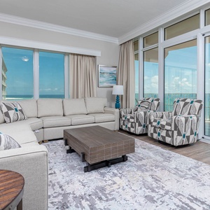 Sink into the plush sofa with a queen sleeper while enjoying natural light and refreshing views