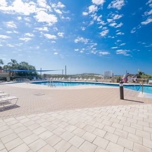 Relax poolside on the spacious patio and soak in the sunshine