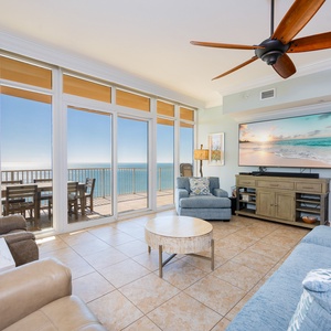 Bask in sunlight while lounging in the family room, enjoying coastal views through expansive glass doors