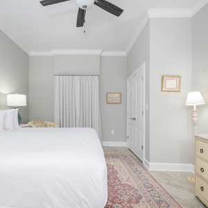 Relax on the cozy king bed in this guest suite and stream your favorite shows after a beach day