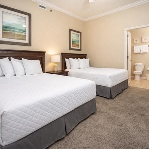Relax on one of the cozy double beds in this guest suite and enjoy a peaceful slumber