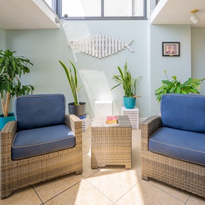 Sit back, relax, and enjoy a cozy spot to gather before your beach adventure