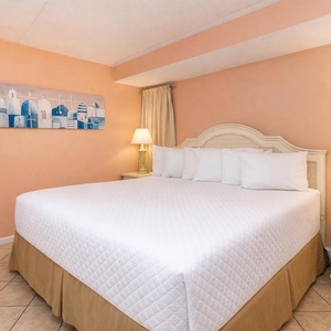 Relax in the king guest suite and let the warm tones of the room create a peaceful escape after a day at the coast