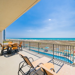 Relax on your extended balcony, taking in soothing coastal views and enjoying the refreshing beach vibe with loved ones
